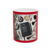 Mug with a red rim and white interior and exterior, featuring various items and the text 'Wake. Pray. Slay.'