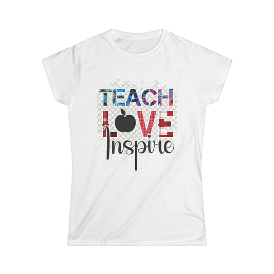 White t-shirt with 'Teach Love Inspire' text and apple graphic on a white background