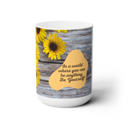 White ceramic 15oz Be Yourself Mug with sunflower design and motivational quote on rustic wood background, microwave and dishwasher safe.