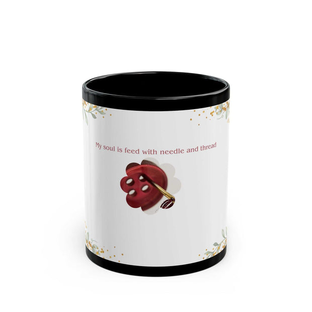 Black ceramic mug with "My soul is fed with needle and thread" text and sewing-themed design, available in 11oz and 15oz sizes