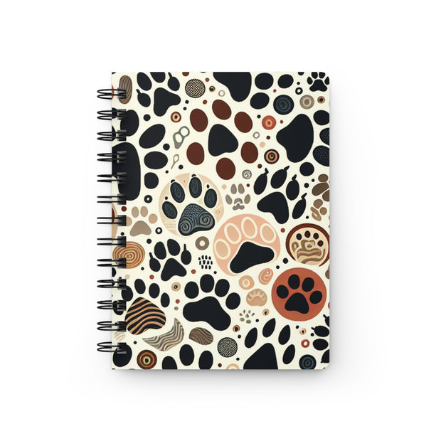 Notebook with paw print pattern on a white background