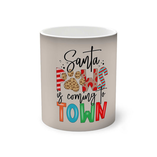 Bring back the magic of youth with a custom Santa Paws is coming to Town color-changing mug. Fill this mug up with 11oz of any hot beverage and watch the black coating fade to reveal your print thanks to the heat-reactive design. Each custom color-changing mug comes with a durable ceramic construction with a glossy finish.