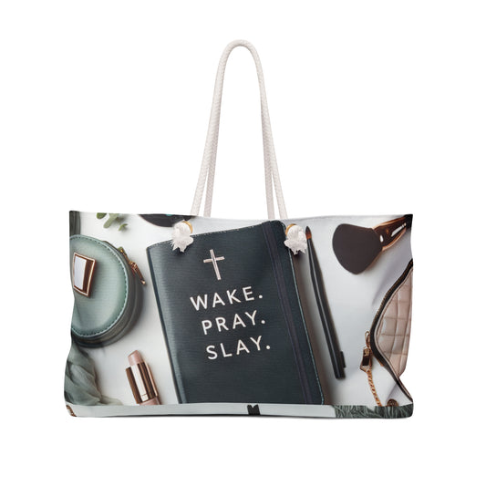 Tote bag with 'Wake. Pray. Slay.' quote and fashion items on a white background
