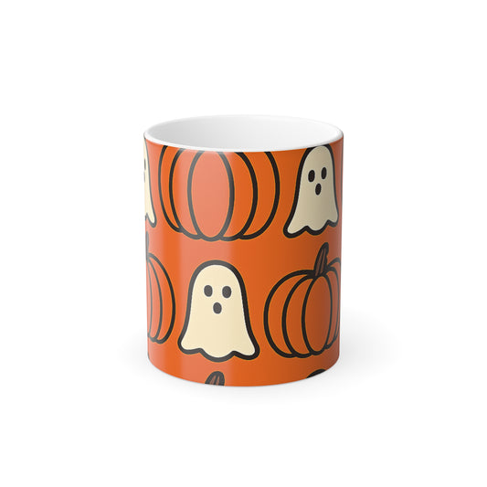 Mug with Halloween-themed design featuring pumpkins and ghosts on an orange background.