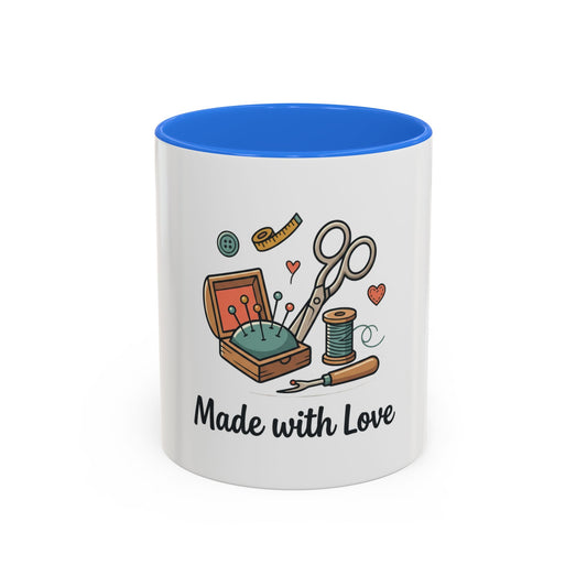 White mug with blue interior and sewing-themed design on a white background with the words Made with Love